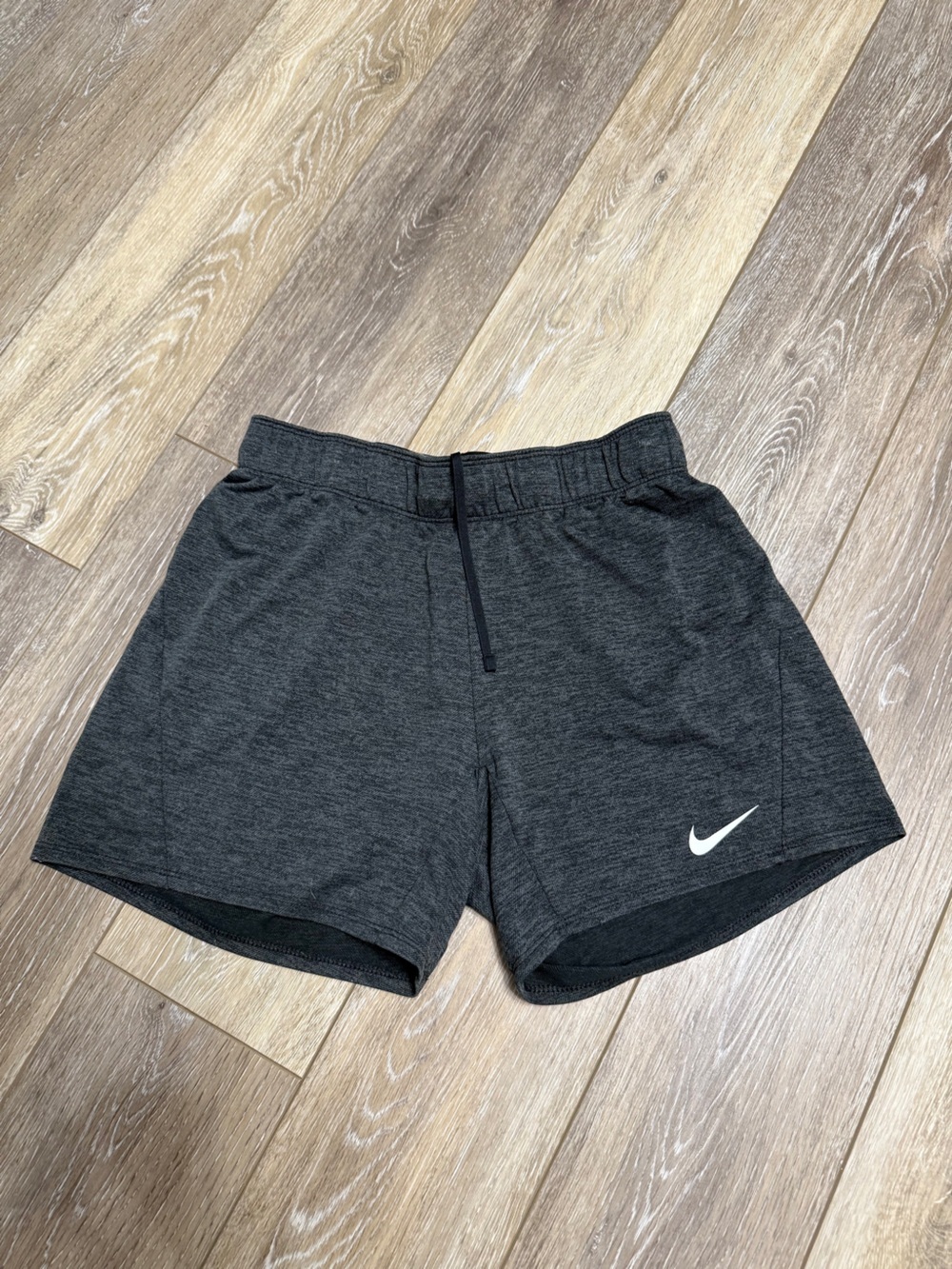 Nike Women’s Charcoal Athletic Shorts with White Swoosh